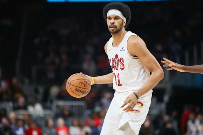 Mar 6, 2024; Atlanta, Georgia, USA; Cleveland Cavaliers center Jarrett Allen (31) handles the ball against the Atlanta Hawks in the first quarter at State Farm Arena.